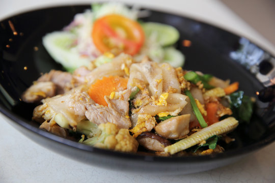 Thai food fried noodle with egg and pork