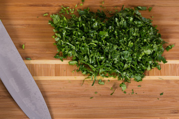 The chef cuts the greens