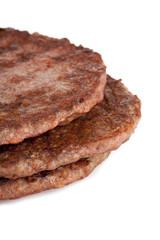 cropped image of cooked beef patties