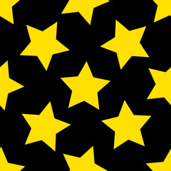 Seamless pattern. Yellow stars on black background