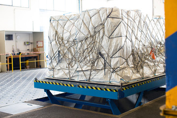 Air freight on lifting machine in air freight warehouse