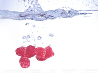 raspberries on water