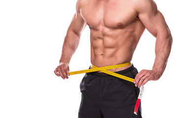 Male torso and measuring tape