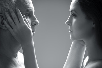 Elderly father and his young daughter