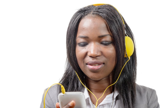 African Girl Holding Mobile Phone And Listening To Music