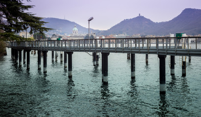 Fototapeta premium Pier pillars in front of Como's landscape