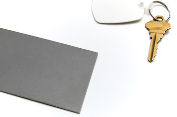 grey card with key over white