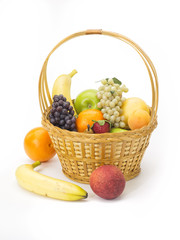 tasty summer fruits in backet isolated on white