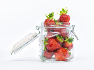 fresh whole strawberries in wooden bowl
