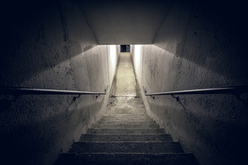 Staircase in the dark tunnel at night - Powered by Adobe