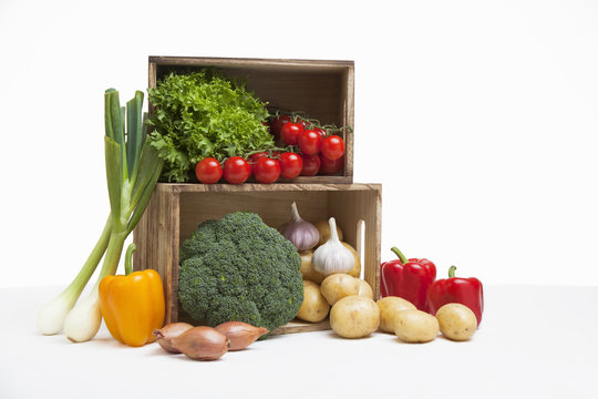Wood crates filled with fresh vegetables