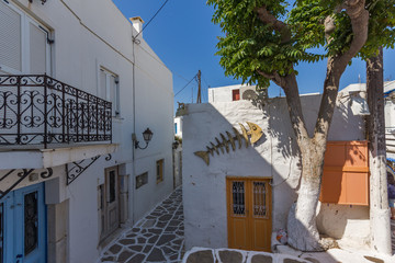 Street with white houses in town of Parakia, Paros island, Cyclades, Greece