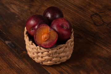 Fresh plums in the basket