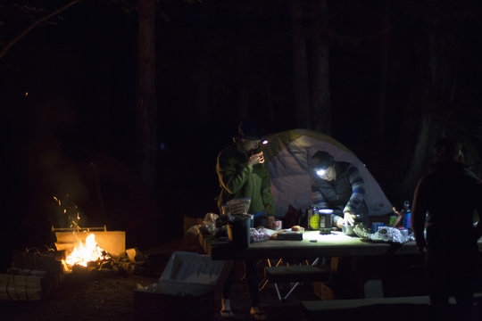 Hikers preparing dinner at camp