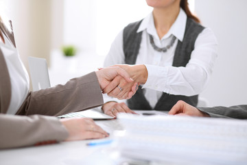 Handshake of business people in negotiations