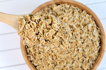 Wooden spoon with oats