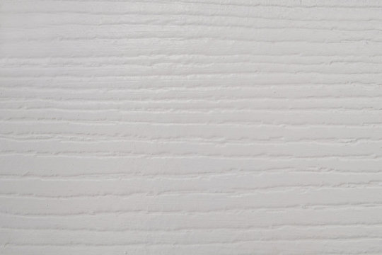 Extreme close-up, painted white wood grain texture