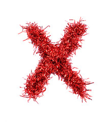 Tinsel Christmas decoration in form of X. On a white background