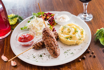kebab with mashed potatoes