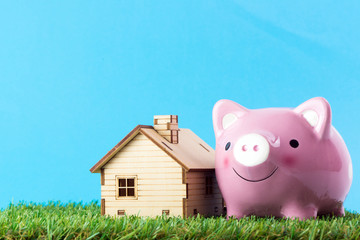 Piggy bank with house