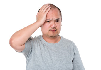 Confused man scratching head