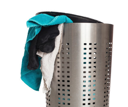 Dirty laundry in a metal basket