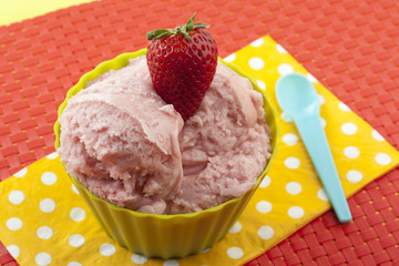 a bowl with strawberry ice cream