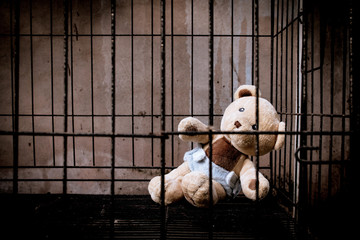 teddy bear in jail vintage tone
