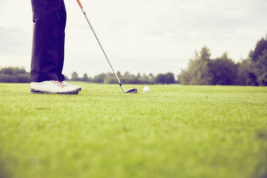 Golfer playing golf on course, Korschenbroich, Dusseldorf, Germany