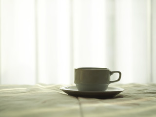 Fototapeta na wymiar Fresh morning coffee on the bed. 