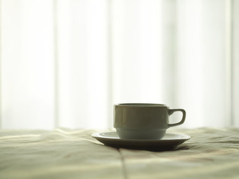 Fresh morning coffee on the bed.
