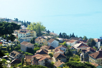Fototapeta na wymiar View on the roofs of houses of the city of Herceg Novi (Montenegro)
