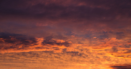 saturated colors colorful sunset . Summers are warm and beautiful sunset . Clouds filled with different colors of the rainbow . the sky as if drawn by an artist's brush