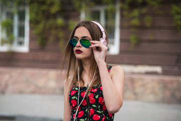 beautiful girl listening to music with headphones