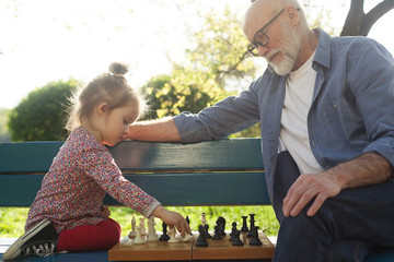 Grandfather and granddaughter spending time together