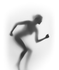 Silhouette of a preparing female runner