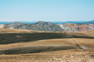 Icelandic landscape with mountain tourist in Landmannalaugar