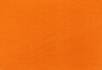 Abstract orange textile texture.