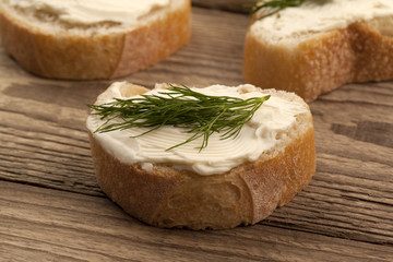 slices of bread with butter and herb