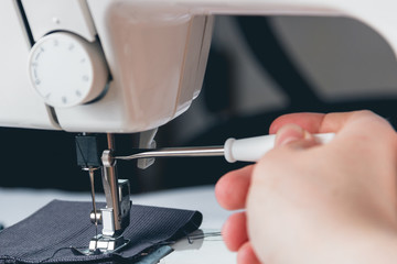 sewing machine and item of clothing