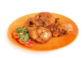 fried chicken on a plate.