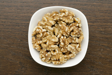 a plate of peeled walnuts