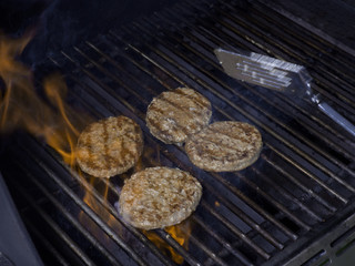 hamburger patties on a grill
