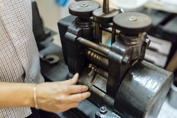 Goldsmith crafting metal