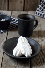 Meringues and cup of tea