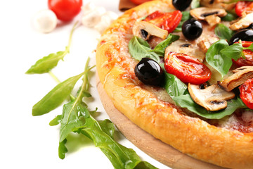 Delicious tasty pizza with vegetables on light background