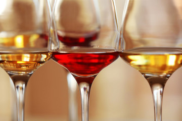 Many glasses of different wine in a row, close up © Africa Studio