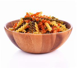 Spiral Pasta in bowl on white background