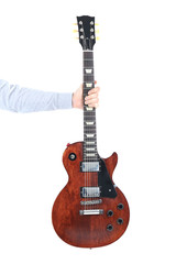 Naklejka premium Man holding brown electric guitar, isolated on white