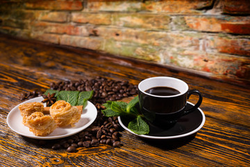 Black Coffee with Gourmet Pastries and Mint